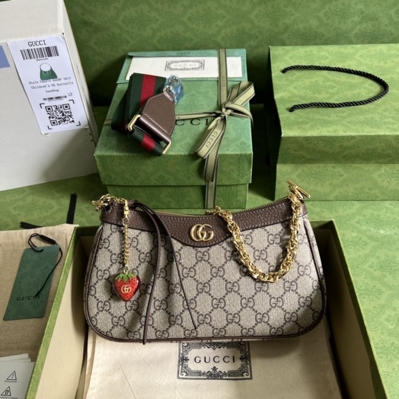G*u*i top handle bags